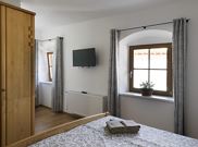 Family room, shower and bath, toilet, east