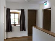 Family room, shower and bath, toilet, east