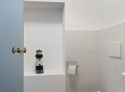 Family room, shower and bath, toilet, east