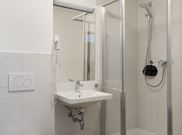 Family room, shower and bath, toilet, east